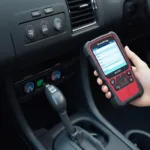 OBD2 Scanner Connected to Car