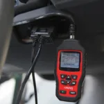 OBD2 Scanner Connected to a Car