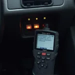 OBD2 Scanner Connected to Car