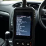 OBD2 Scanner Displaying Diagnostic Trouble Codes