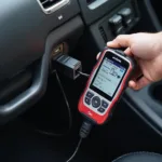 OBD2 Scanner Universal Connected to a Car's Diagnostic Port