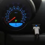 OBD2 Smart Gauge Connected to a Car's OBD2 Port