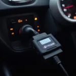 OBD2 Tuning Device Plugged In