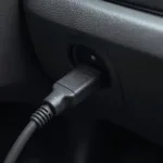 OBD2 USB cable connected to a car's OBD2 port