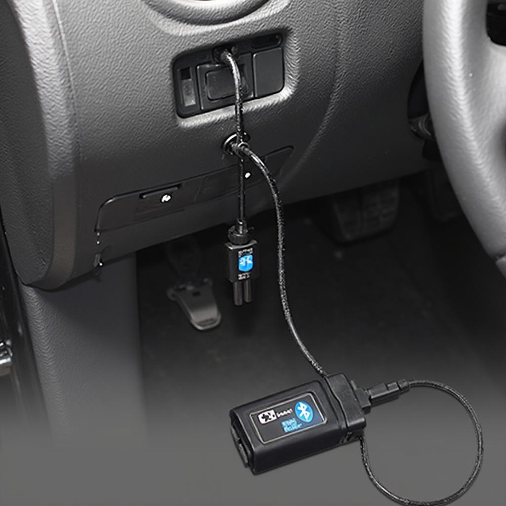 ELM327 Bluetooth Scanner Connected to Car OBD2 Port