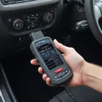 Kobra OBD2 Scanner Connected to Port