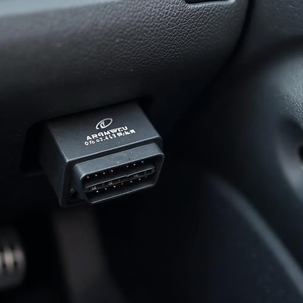 OBD2 Adapter Connected to a Car's OBD2 Port