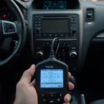 OBD2 Scanner Connected to Car